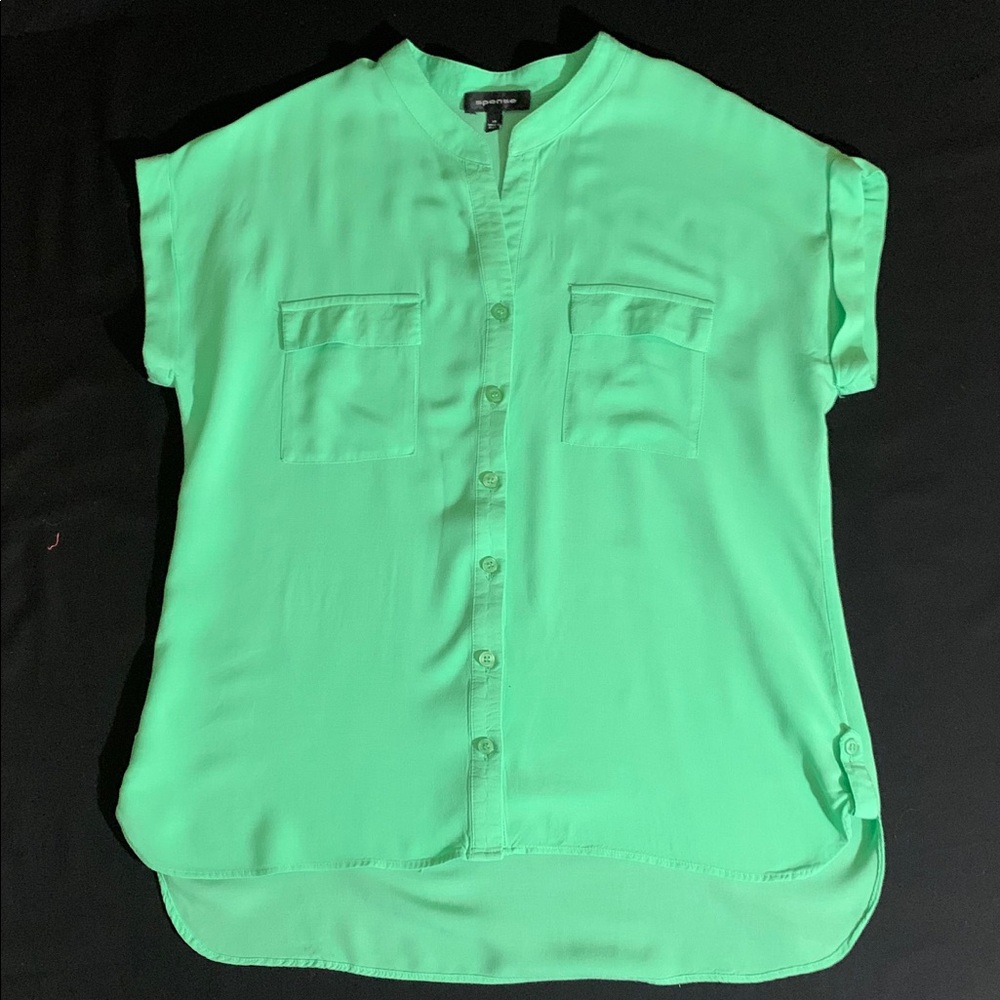 Very appealing button up lightweight green top.